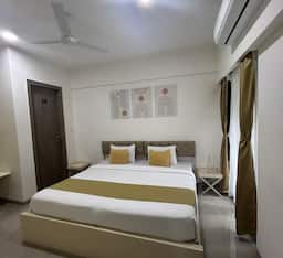 Deluxe Room (Private, non-attached washroom) in a shared 2BHK apartment