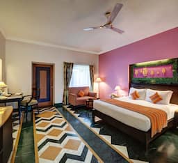 Deluxe Room (with Private Sit-Out area) with Garden View with (Happy Hours: Buy 2 Get 1)