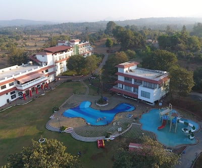 https://imgcld.yatra.com/ytimages/image/upload/t_hotel_yatra_city_desktop/v1487832103/Hotel/Silvassa/00003901/Gulmohar_Aerial_View_EkyMf5.jpg