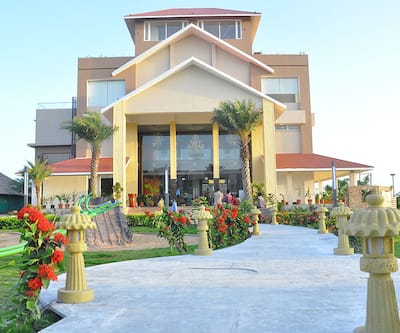 https://imgcld.yatra.com/ytimages/image/upload/t_hotel_yatra_city_desktop/v1488344954/Hotel/Jamnagar/00063358/Facade_a6Ghz5.jpg