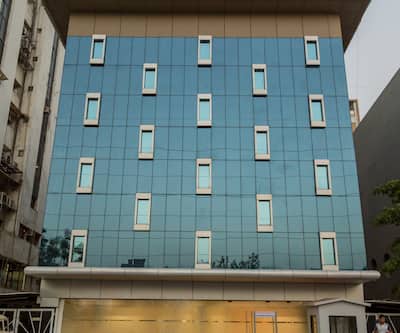 https://imgcld.yatra.com/ytimages/image/upload/t_hotel_yatra_city_desktop/v1494478938/Hotel/Ahmedabad/00085865/Facade_-_Satellite_jtkzVd.jpg
