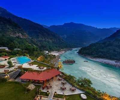 https://imgcld.yatra.com/ytimages/image/upload/t_hotel_yatra_city_desktop/v1494837461/Hotel/Rishikesh/00021893/1_0aScjx.jpg