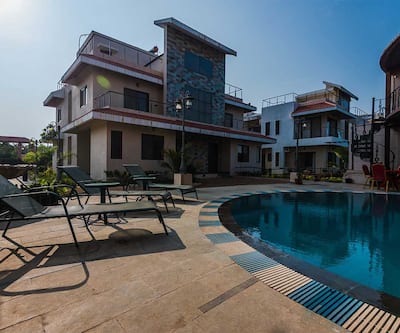 https://imgcld.yatra.com/ytimages/image/upload/t_hotel_yatra_city_desktop/v1505717707/Hotel/Alibag/00096625/cozy1_iOyuqA.jpg