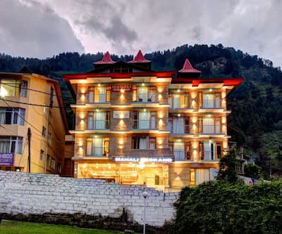 https://imgcld.yatra.com/ytimages/image/upload/t_hotel_yatra_city_desktop/v1508747938/Hotel/00088058/Front_View__hotel-Manali-Grand_XEdn2x.jpg