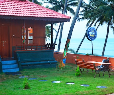 https://imgcld.yatra.com/ytimages/image/upload/t_hotel_yatra_city_desktop/v1530529834/Hotel/Varkala/00012063/Exterior_-_Black_beach_resort,_Varkala_mXATeZ.jpg