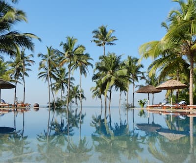 https://imgcld.yatra.com/ytimages/image/upload/t_hotel_yatra_city_desktop/v1531217215/Hotel/00020443/Neeleshwar_Infinity_Pool_EYDRqr.jpg