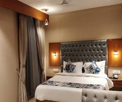 https://imgcld.yatra.com/ytimages/image/upload/t_hotel_yatra_city_desktop/v1570436917/Hotel/Ahmedabad/00176303/sk-lords-eco-inn-ahmedabad5_mncG8T.jpg