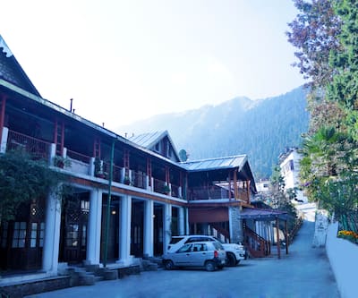 https://imgcld.yatra.com/ytimages/image/upload/t_hotel_yatra_city_desktop/v1575264202/Hotel/Nainital/00001381/13887259_hotel_overview_hd_z05nNT.jpg