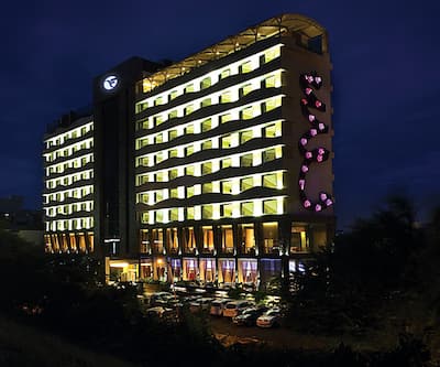 https://imgcld.yatra.com/ytimages/image/upload/t_hotel_yatra_city_desktop/v3576013245/Hotel/Ahmedabad/00189445/Facade_9FZR7x.jpg