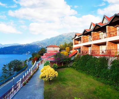 https://imgcld.yatra.com/ytimages/image/upload/t_hotel_yatra_city_desktop/v6166796614/Hotel/Nainital/00006100/1_Neelesh_Inn_A_Luxury_Lake_view_Hotel_20_KMS_from_Nainital_Main_Display_Image_keRtEc.jpg