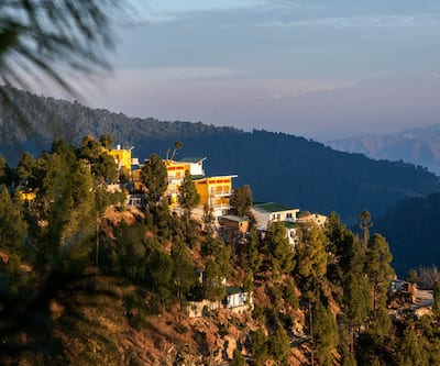 https://imgcld.yatra.com/ytimages/image/upload/t_hotel_yatra_city_desktop/v7238663646/Hotel/Mukteshwar/00185199/Destination_Wedding_Venue_Mukteshwar_Nainital_BwLvfY.png