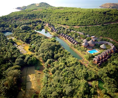 https://imgcld.yatra.com/ytimages/image/upload/t_hotel_yatra_city_desktop/v7845279687/Hotel/Gokarna/00187777/SwaSwara_Ayurveda_and_Yoga_on_Om_Beach_Aerial_view_o3FKA9.JPG