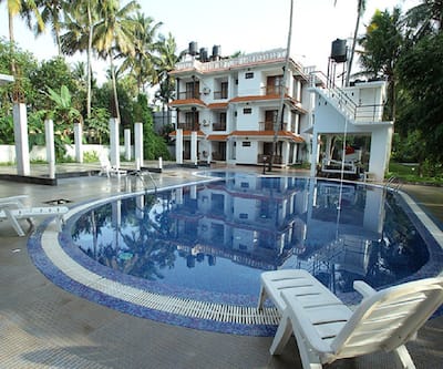 https://imgcld.yatra.com/ytimages/image/upload/t_hotel_yatra_city_desktop/v8952661039/Hotel/Varkala/00017685/13_u0CbJZ.jpg