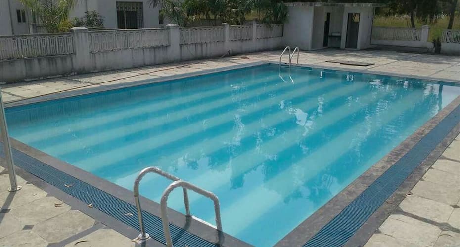 Lilac Homestays. 2 BHK serviced Apartment with a common pool, Lonavala 2