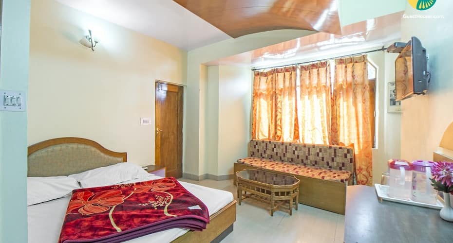 Well-appointed room on Mall Road with a scenic view, Shimla 2