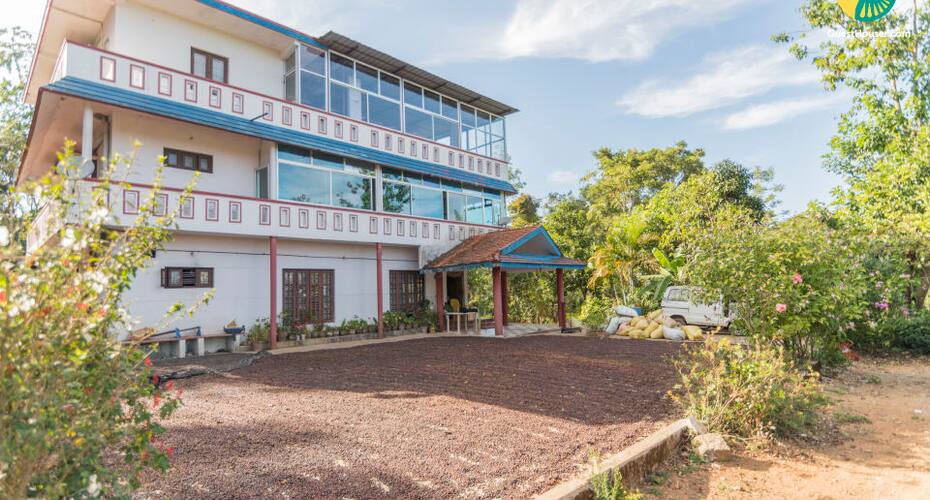 Comfy single room accommodation for trekkers, Madikeri 1