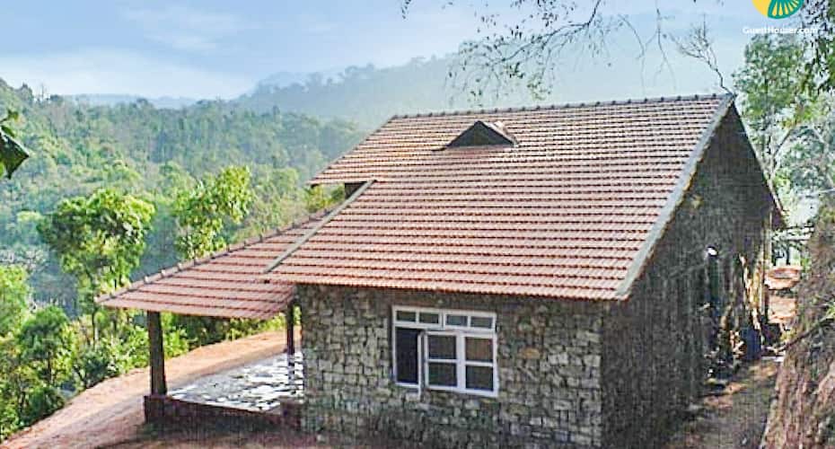 Stone cottage with wooden furnishing ideal for a family, Coorg 1