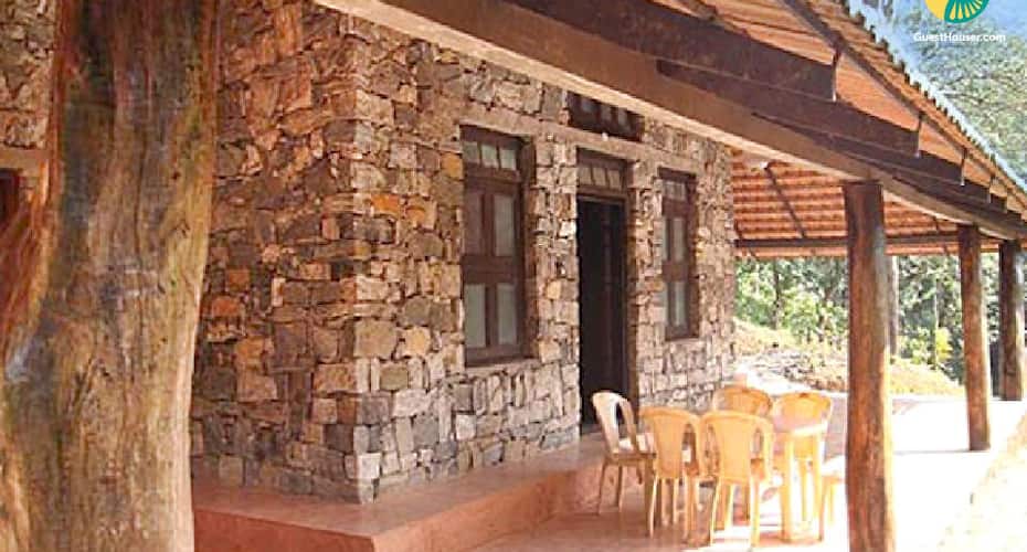 Stone cottage with wooden furnishing ideal for a family, Coorg 2