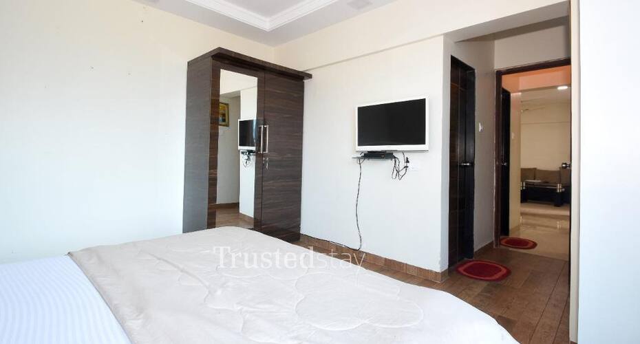 TrustedStay Tulsi Aura Building, Mumbai 4