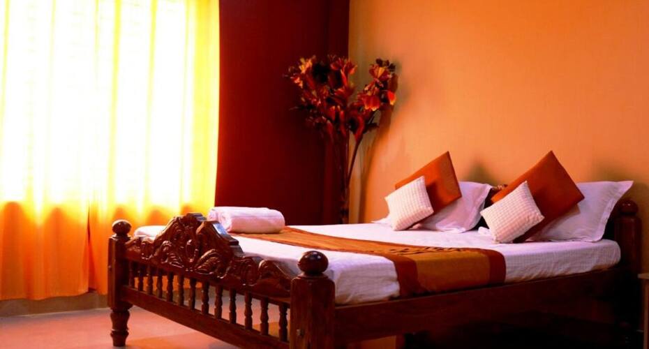 Holidayin coorg Delight Inn, Madikeri 5